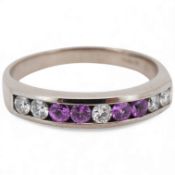 A recent 18ct white gold, four stone pink sapphire and five stone diamond set half hoop ring, size