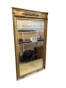 A late 19th century giltwood and composition pier glass, width 83cm, height 145cm
