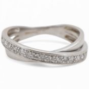 A recent 18ct white gold and diamond set twin band crossover ring, size L, gross weight 3.5 grams.