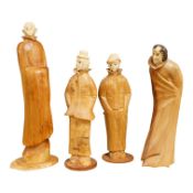 Pierre Decorse (b.1953), a group of four carved figures, tallest 29cm high