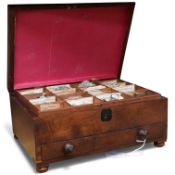 An early 19th century mahogany cased collection of mineral samples with old labels, comprising two
