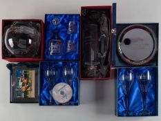 A group of seven modern horse racing trophies.