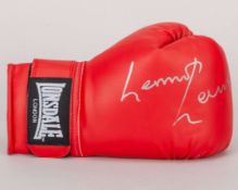 Boxing glove signed by Lennox Lewis