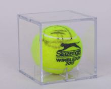 An autographed Novak Djokovic Wimbledon tennis ball, 2015