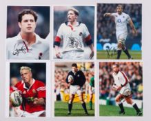 Fourteen autographed photographs of rugby union international players