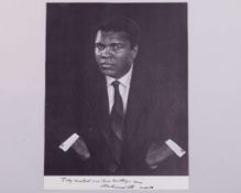 A black and white autographed and dedicated Muhammad Ali signed photograph&nbsp;