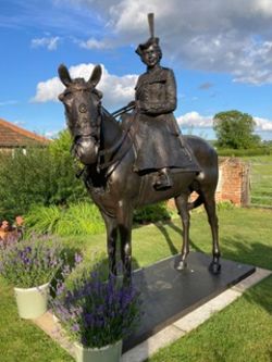A Regal Partnership in Bronze - Her Late Majesty and Burmese Timed Auction