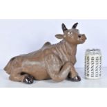 A large glazed pottery Ox 22 x 36cm