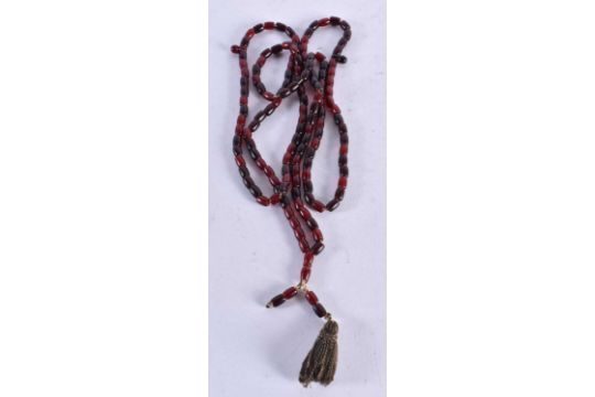 A CHERRY AMBER TYPE NECKLACE. 29 grams. 110 cm long. - Image 1 of 3