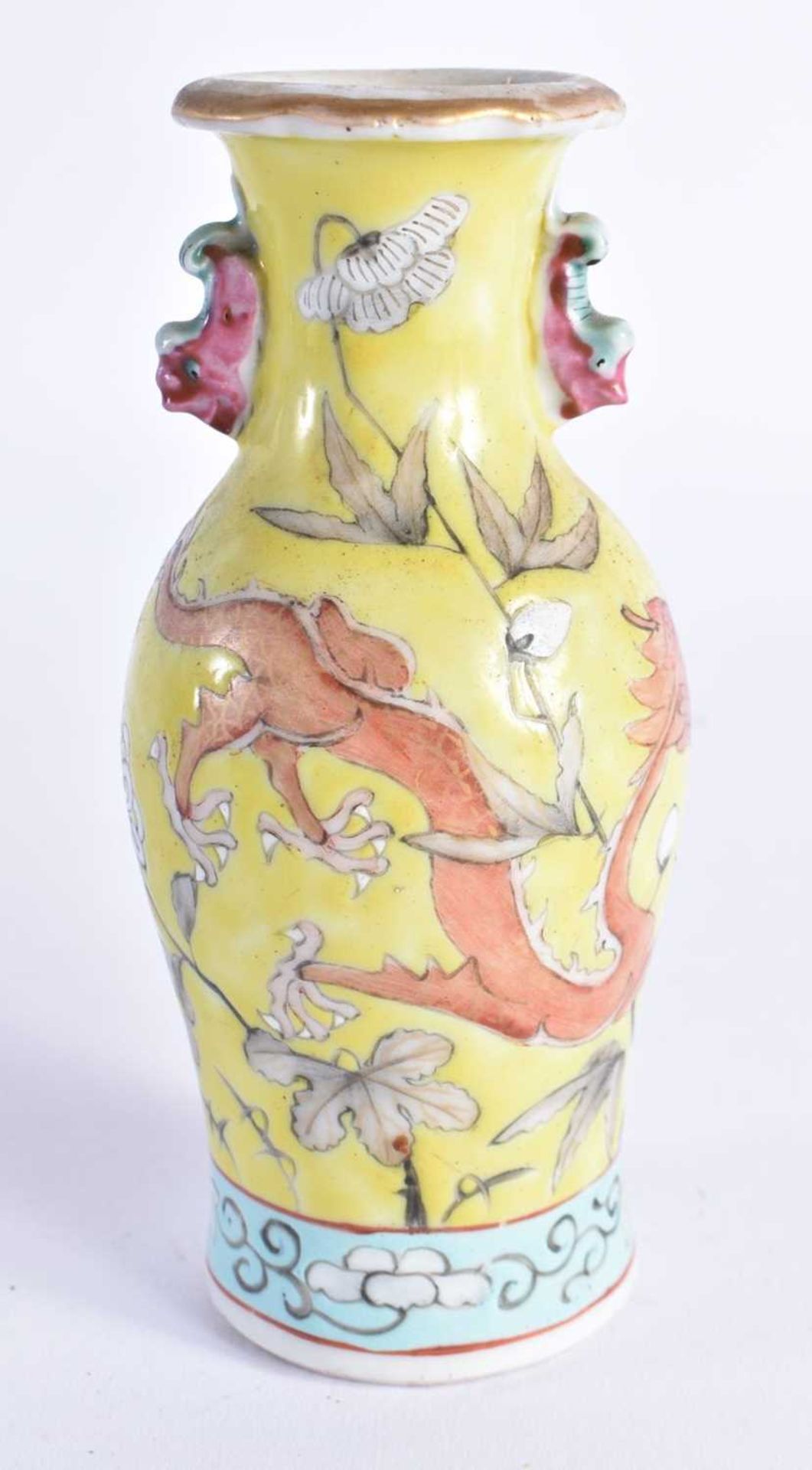 A 19TH CENTURY CHINESE FAMILLE JAUNE PORCELAIN VASE Qing. 12.75 cm high.