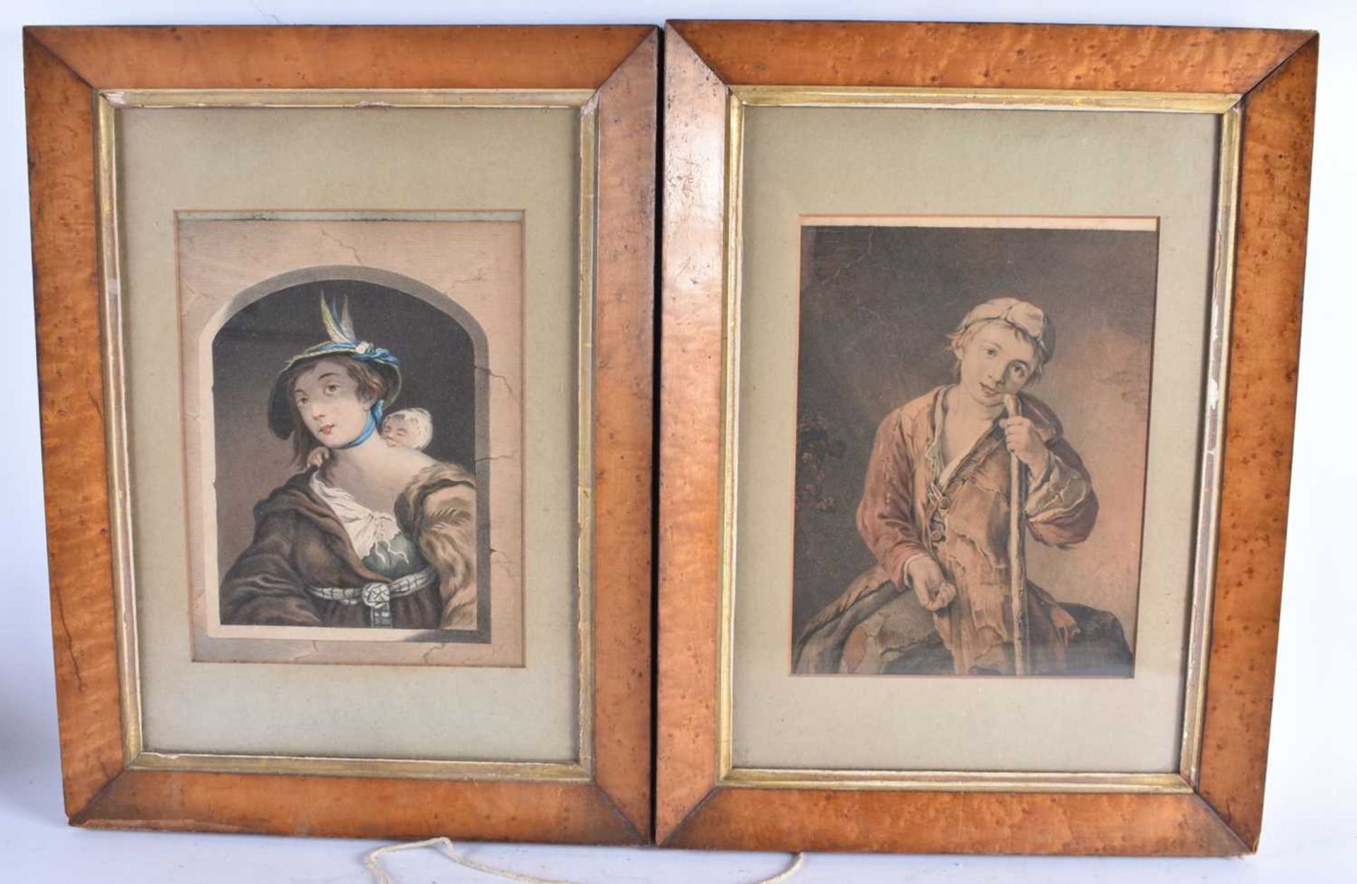 A PAIR OF 19TH CENTURY ENGLISH HAND COLOURED ENGRAVINGS depicting portraits. 45 cm x 35 cm.