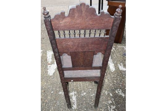 A 19TH CENTURY BURMESE CARVED WOOD SINGLE CHAIR with beast supports. 127 cm x 64 cm x 53 cm. - Image 5 of 5