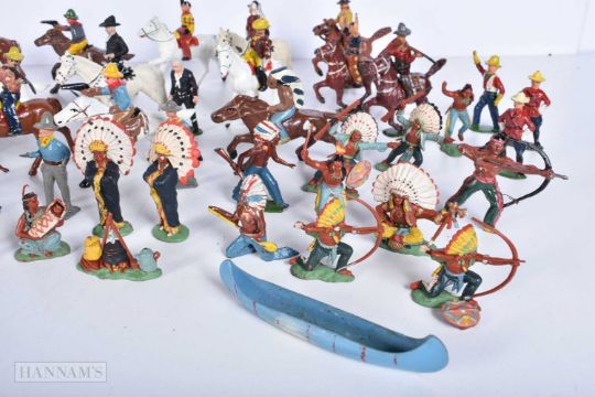 A collection of vintage metal models, Cowboys , Indians, WW2 army and Naval figures , Heraldic , - Image 9 of 9