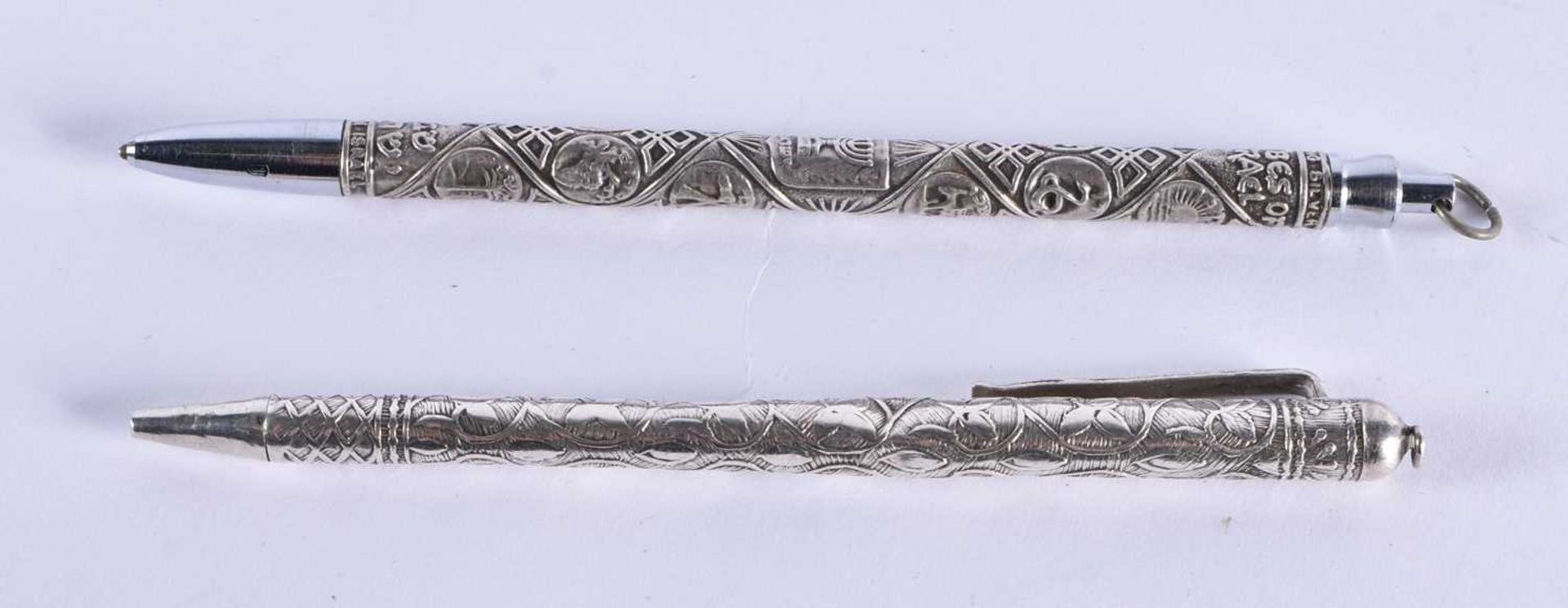 TWO SILVER PENCILS. 20.8 grams overall. 11.5 cm long. (2)