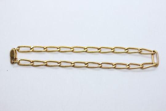 AN OPEN CURB BRACELET MARKED 750 L 19.5CM. - Image 1 of 12