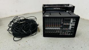 A EUROPOWER PMP16805 MIXER AND A BOX CONTAINING AN ASSORTMENT OF LEADS (NO POWER CABLE) - SOLD AS