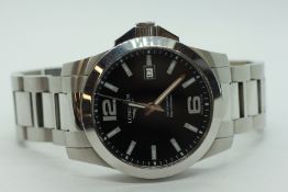 LONGINE CONQUEST AUTOMATIC MOVEMENT, WATER RESISTANT TO 1000 FEET. SCREW DOWN CROWN.