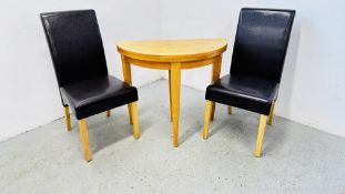 A MODERN BEECH FINISH FOLDING HALF MOON BREAKFAST TABLE + A PAIR OF BROWN FAUX LEATHER DINING