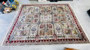 A VINTAGE PERSIAN RUG.