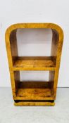 A REPRODUCTION BURR WALNUT ARCHED TOP OPEN SHELF IN THE STYLE MEOLA INTERIORS, W 50 X D 31 X H 95CM.