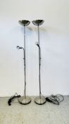 A PAIR OF MODERN DESIGNER BRUSHED STEEL UPLIGHTERS - SOLD AS SEEN.