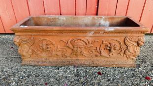 A RECTANGULAR TERRACOTTA PLANTER OF CLASSICAL DESIGN.