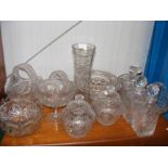 A large collection of cut glassware, including dec