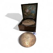 A Victorian polyphon with 8 inch metal discs (14) -