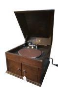 An HMV oak cased table top gramophone with doors t