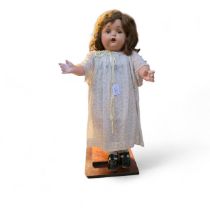 A Mae Starr American talking doll - fitted with a