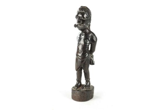 A 20TH CENTURY AFRICAN CARVED EBONY FIGURE OF A SLAVE - Image 1 of 6