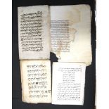 A quantity of Islamic manuscripts (Koran?) (Q).