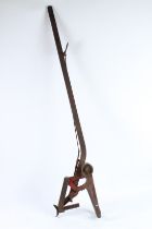 A VINTAGE CAST IRON JACK. 144cms high.