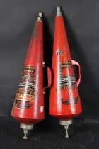 TWO RED FIRE EXTINGUISHERS.