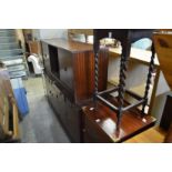 An oak occasional table, storage chest, sideboard and TV stand.