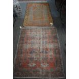 Two Persian rugs, worn, 155cm x 100cm and 130cm x 106cm.