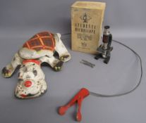 MOBO 'Scottie' - Squeeze the grip and see me scamper along tin toy & Merit Student's microscope No2