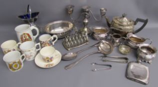Collection of silver plate includes footed basket with blue glass liner, large ladle and spoon,