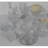 Selection of glass including large candle holder with candle and other candlesticks, decanters,