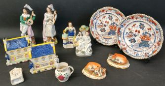 2 Prattware style chapel money boxes, pair of recumbent Staffordshire greyhounds, pair of Amherst