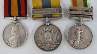 Group of 3 medals awarded to Pte T Barker 6003 of Grenadier Guards:  Queen Victoria Sudan medal,