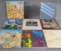 Collection of vinyl records includes Curved Air, Steve Hillage, Dr. Feelgood, Peter Hammill,