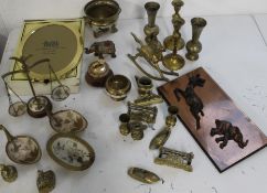 Selection of brass ornaments, vases , candlesticks