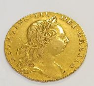 George III gold guinea 1766, 8.38g,  24mm dia.
