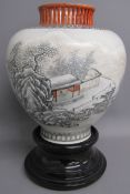 Chinese vase on ceramic stand with painted snow scene and decoration to neck and foot - ribbon