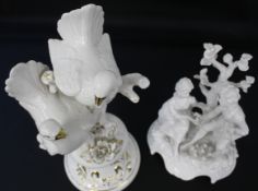 Two white glazed figurines, Capodimonte figurines of two doves on pedestal, white with gilt 45cm and