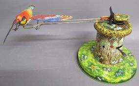 Clockwork humming bird - Western Germany tin plate NR 8 with Meccano winding key and original part