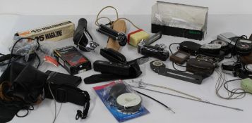 Large selection of camera accessories including light meters, flash meters, remote shutter cables,