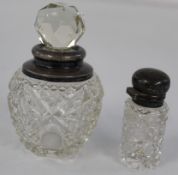 Two early 20th century silver necked scent bottles1 x 10cm, 1 x 6.5cm