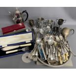Large quantity of silver plate cutlery, place mats etc